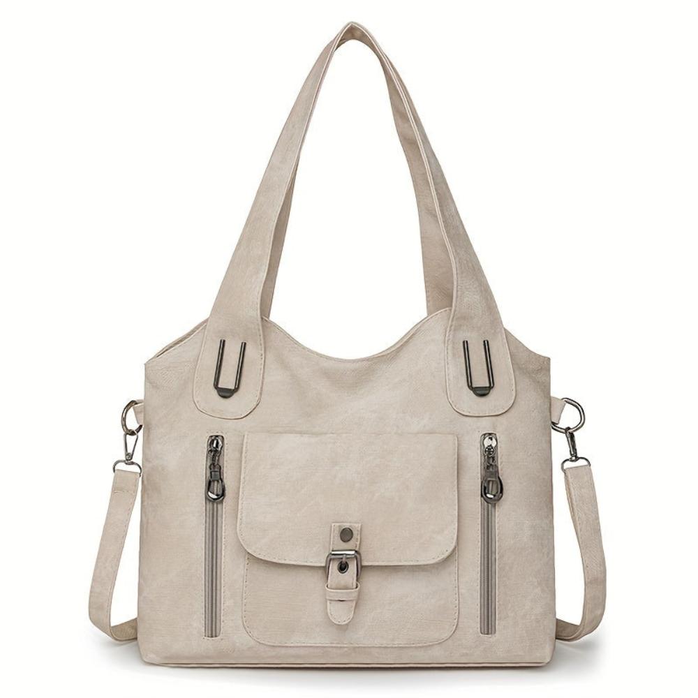 Elises Schultertasche voller Charme
