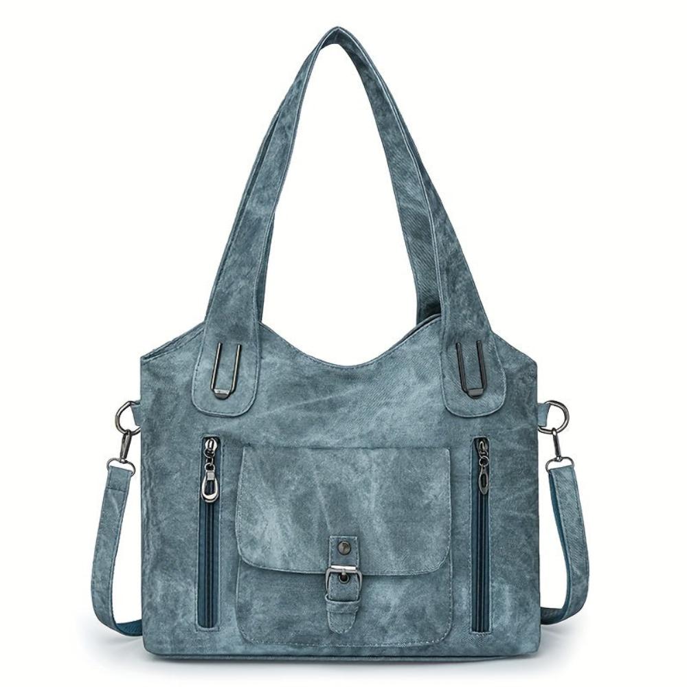 Elises Schultertasche voller Charme