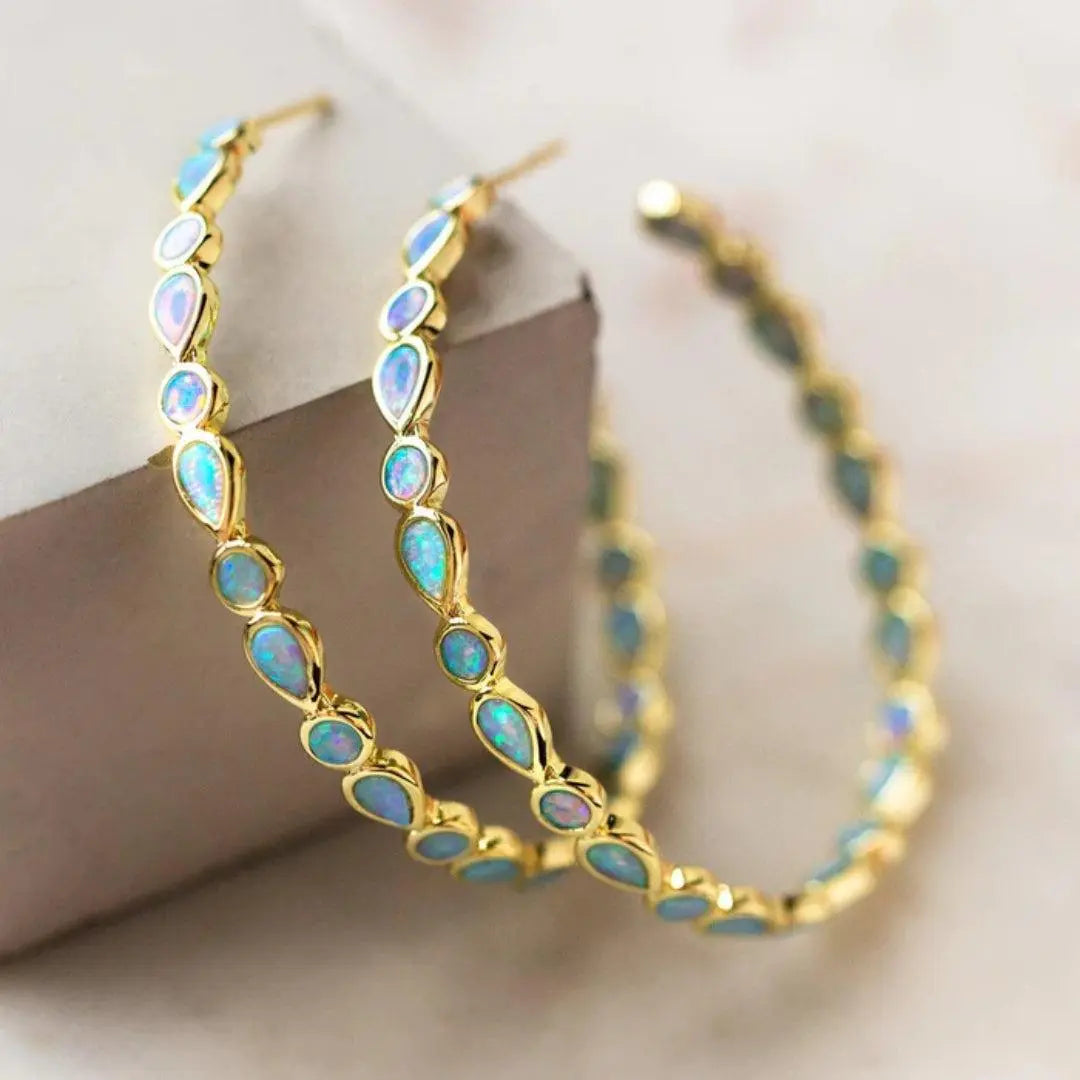 Retro Ohrringe aus Blauopal und Goldene