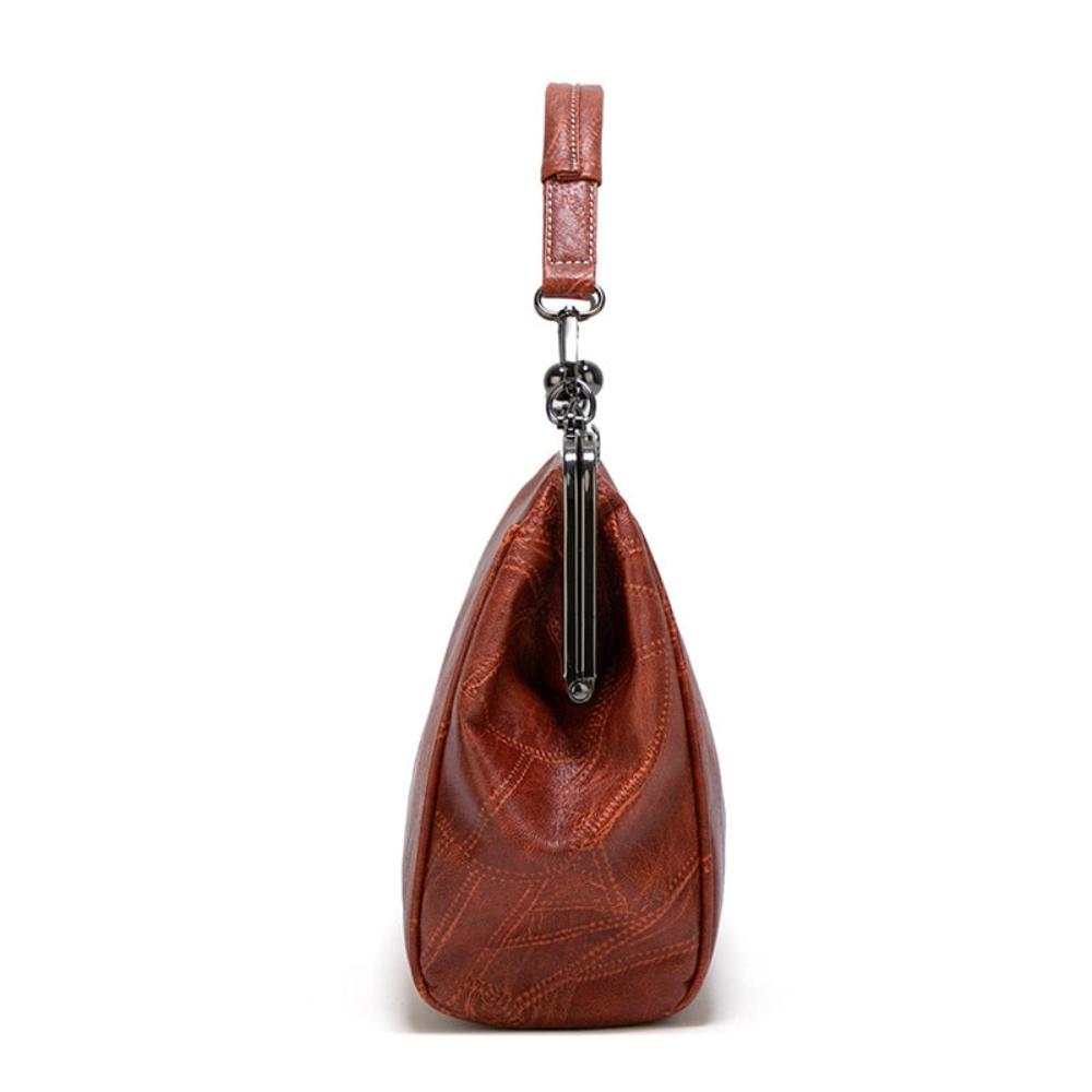 Kussverschluss-Handtasche – elegant