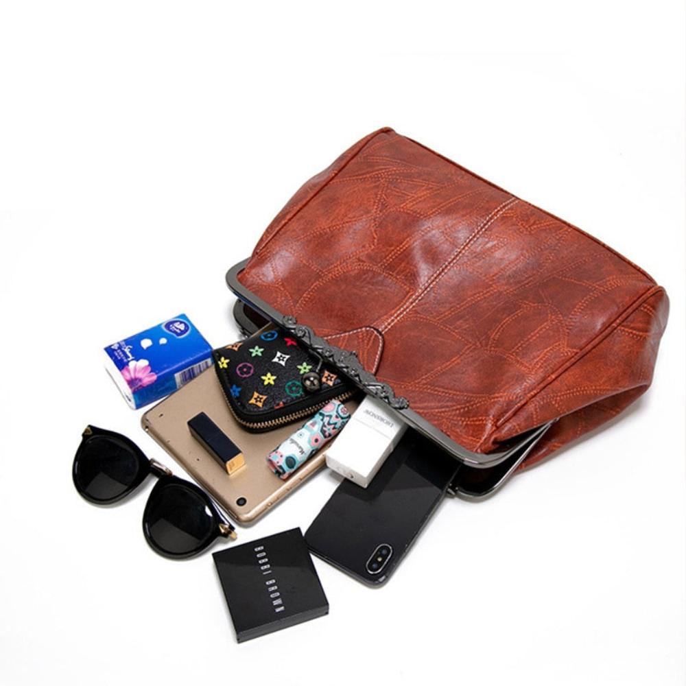 Kussverschluss-Handtasche – elegant