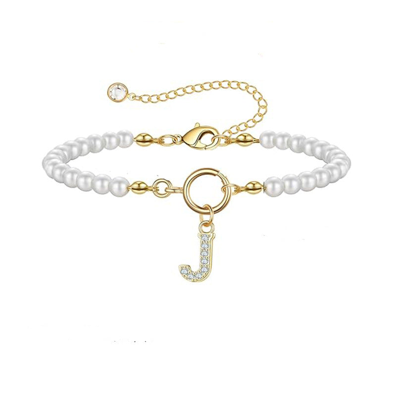 Auden Clé Buchstabenarmband | Gold