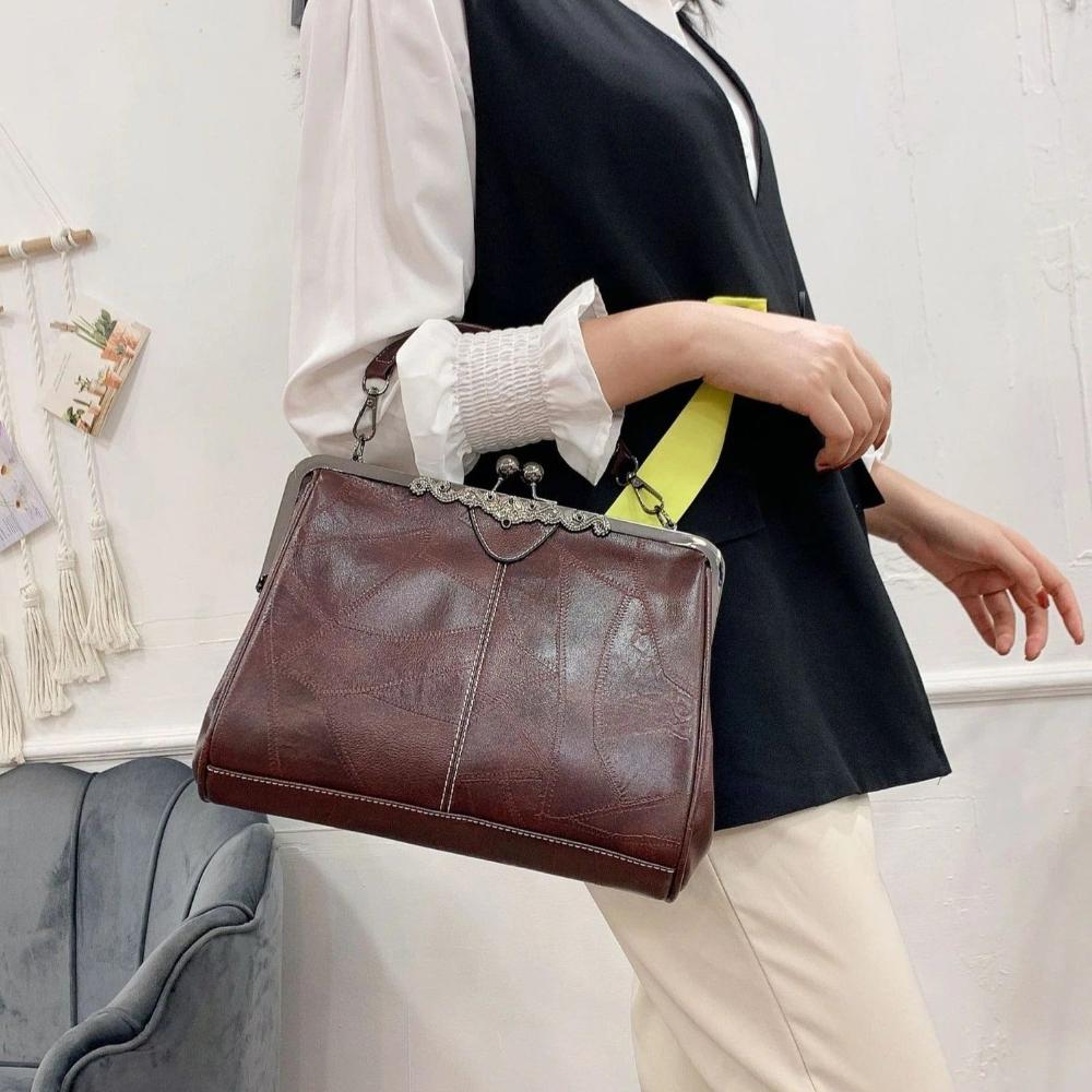 Kussverschluss-Handtasche – elegant