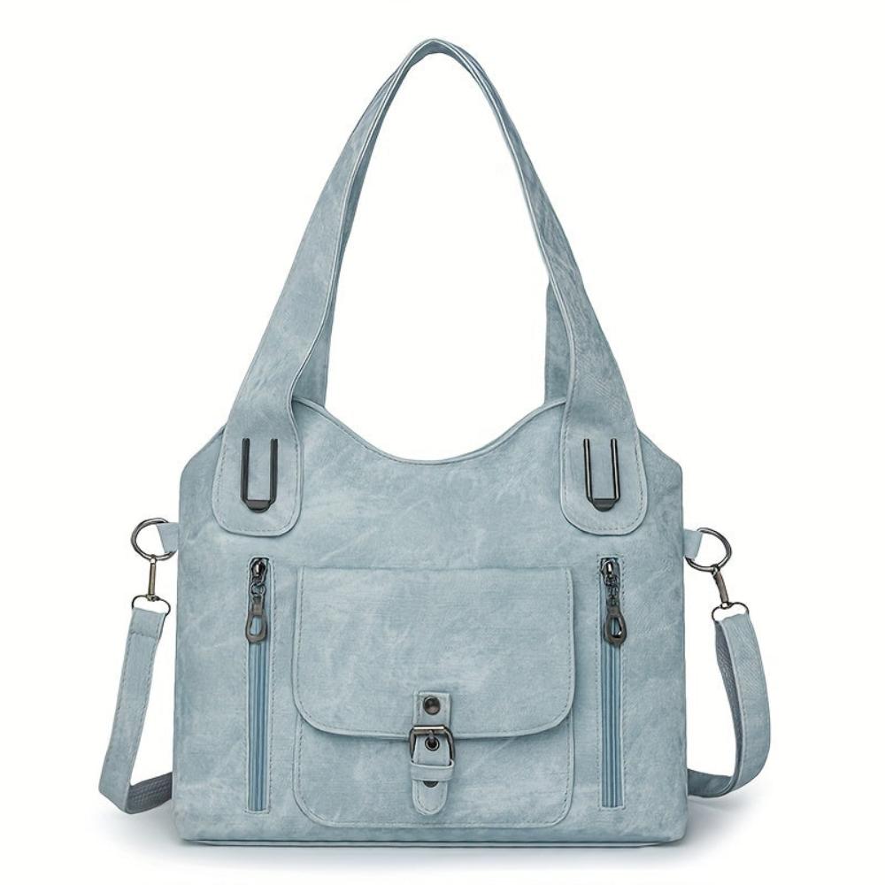 Elises Schultertasche voller Charme