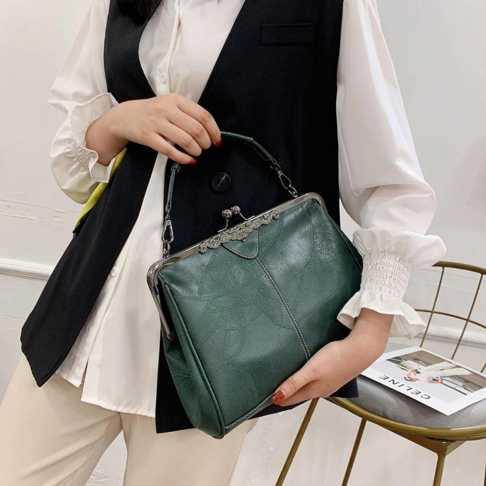 Kussverschluss-Handtasche – elegant