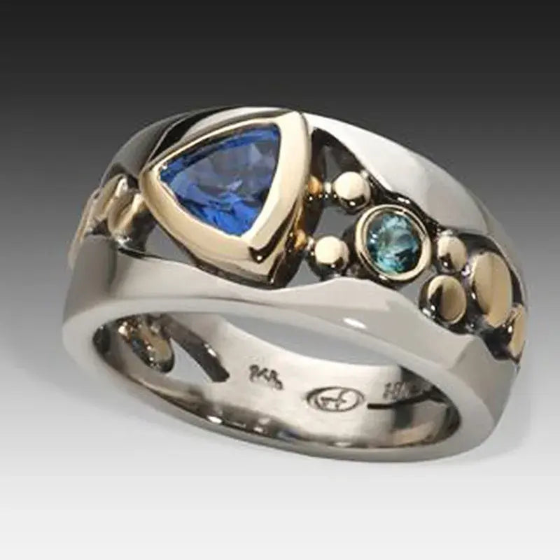 Retro Ring mit blauem Kristall